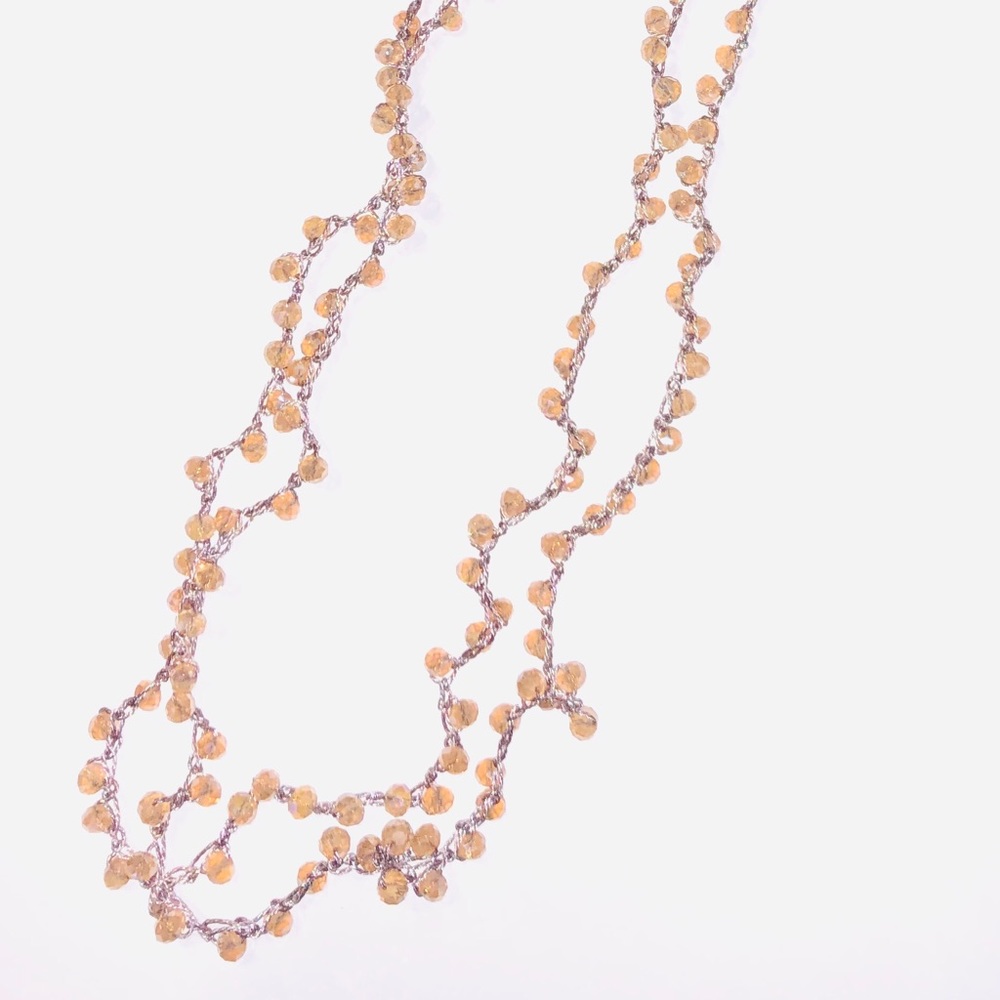 Delicate blush crystals with crochet threading